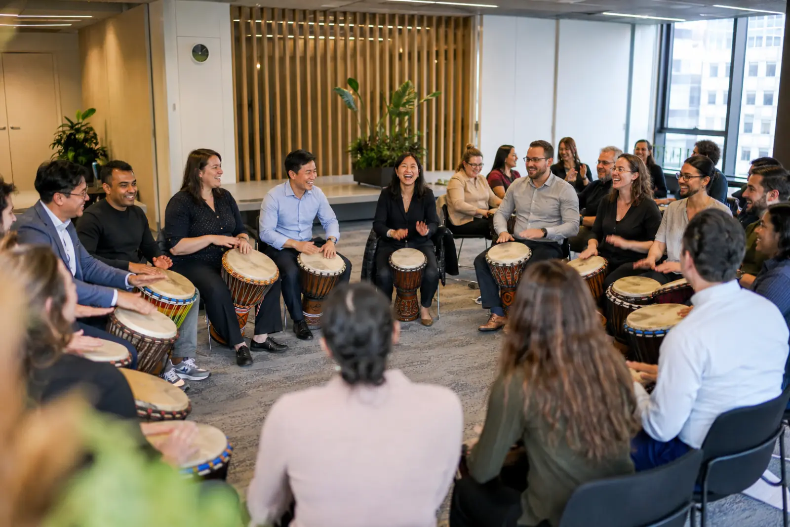 Corporate team drumming session